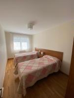 Postel nebo postele na pokoji v ubytování dpCristal Calvo Sotelo 164, 4C