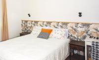 SG ROOMSにあるベッド