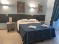 Posteľ alebo postele v izbe v ubytovaní Residence Lodi