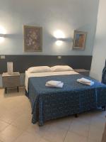 Posteľ alebo postele v izbe v ubytovaní Residence Lodi