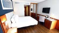 Łóżko lub łóżka w pokoju w obiekcie Travelodge Madrid Coslada Aeropuerto