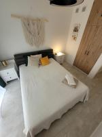 Posteľ alebo postele v izbe v ubytovaní Apartament Boho #Basen#Sauna#Siłownia#Garaż