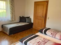 Łóżko lub łóżka w pokoju w obiekcie Apartment Bauernhof Gasteg-3 by Interhome