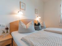 Łóżko lub łóżka w pokoju w obiekcie Holiday Home Erlachhof by Interhome