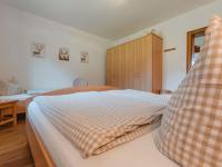 Łóżko lub łóżka w pokoju w obiekcie Holiday Home Erlachhof by Interhome