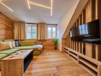 TV a/nebo společenská místnost v ubytování Apartment Máj-4 by Interhome