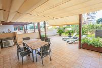 A seating area at LITORAL COSTA DORADA - MARINA BAJO Only families