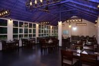 En restaurant eller et andet spisested på Shree Kalya Resort- Chikmagalur