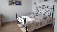 A bed or beds in a room at B&B Mimosa e Lillà