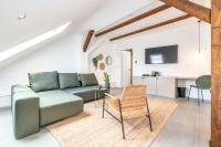 Televízia a/alebo spoločenská miestnosť v ubytovaní Apartman Kaptol