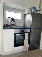 Luxus Tiny House Saagalaにあるキッチンまたは簡易キッチン