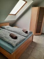 Postel nebo postele na pokoji v ubytování Apartament Jastarnia