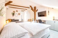 Posteľ alebo postele v izbe v ubytovaní Apartman Kaptol