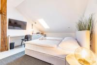 Posteľ alebo postele v izbe v ubytovaní Apartman Kaptol