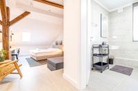 Posteľ alebo postele v izbe v ubytovaní Apartman Kaptol