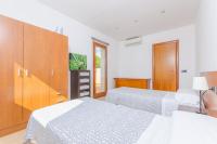 A bed or beds in a room at Charming Villa with Private Pool in Illes Balears