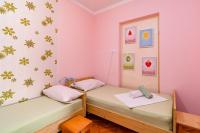 Postel nebo postele na pokoji v ubytování Apartments and rooms by the sea Banjol, Rab - 5077