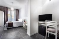 A bed or beds in a room at Hotel Star