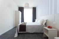 A bed or beds in a room at Hotel Star