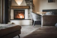 Posezení v ubytování Chalet BERGSUCHT in Ruhpolding Bayern, Traumlage am sonnigen Südhang, kostenlose Parkplätze, schnelles WLAN, ruhige Sackgasse, NETFLIX inklusive