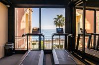 a room with a view of the ocean from a gym at Best Western Premier Hotel Prince de Galles in Menton