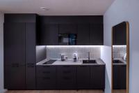 Kuchyň nebo kuchyňský kout v ubytování VILLAR Suites by Cadiz4Rentals