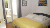 Posteľ alebo postele v izbe v ubytovaní Apartments Aba