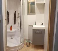 a bathroom with a shower and a toilet and a sink at Petit Paradis au calme en plein Marseille in Marseille