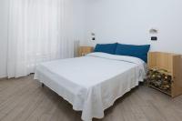 Posteľ alebo postele v izbe v ubytovaní Residence Oleandro