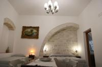 Postel nebo postele na pokoji v ubytování Antico Monastero