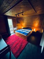 A bed or beds in a room at Chata na Liptove