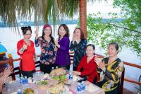 a group of women standing around a table at HƯNG THÀNH HOME in Ben Tre