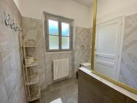 a bathroom with a shower and a mirror at Le LOUIS 16 - Maison avec jardin in Valence