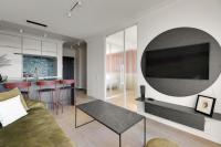 Telewizja i/lub zestaw kina domowego w obiekcie Grand Apartments Chlebova