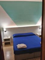 A bed or beds in a room at Cannone d'Oro