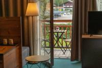 TV a/nebo společenská místnost v ubytování AlpenParks Hotel MONTANA