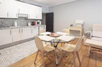 Una cocina o zona de cocina en Apartamentos Santa Lucia