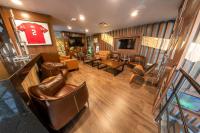 TV a/nebo společenská místnost v ubytování The Inn at Mazatlan