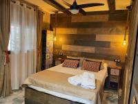 A bed or beds in a room at Casa Apartamento Rural U Penafrol