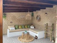 A seating area at Casa Apartamento Rural U Penafrol