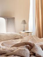 A bed or beds in a room at Il Cantuccio di Gioia