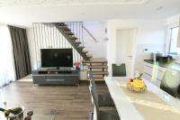 TV a/nebo společenská místnost v ubytování Holiday Luxury Resort Sundance