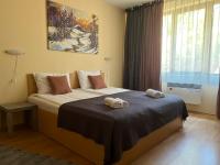 Postel nebo postele na pokoji v ubytování Minkov Apartments, Замъка 2