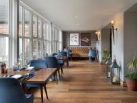 Ein Sitzbereich in der Unterkunft Delta Hotels by Marriott Worsley Park Country Club