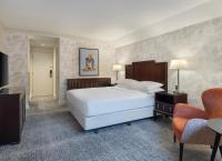Ein Bett oder Betten in einem Zimmer der Unterkunft Delta Hotels by Marriott Worsley Park Country Club