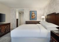 Ein Bett oder Betten in einem Zimmer der Unterkunft Delta Hotels by Marriott Worsley Park Country Club