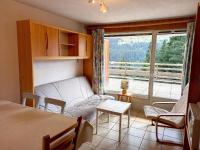 Łóżko lub łóżka w pokoju w obiekcie Charmant appartement 3 pièces, terrasse, ski à proximité - FR-1-425-135