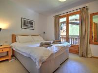 Posteľ alebo postele v izbe v ubytovaní Bel Appartement Spacieux à Morzine - 8 Personnes, 90m², Accès Direct aux Pistes et Téléphérique - FR-1-524-109