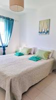 Posteľ alebo postele v izbe v ubytovaní Two-bedroom apartment with two large terraces