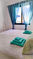 Posteľ alebo postele v izbe v ubytovaní Two-bedroom apartment with two large terraces